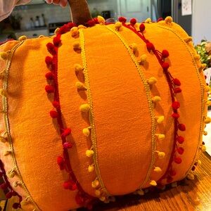 NWT pumpkin pillow.